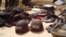 Soldiers stand behind items recovered from suspected Boko Haram members, Bukavu Barracks in Kano, Nigeria, March 21, 2012 (file photo).
