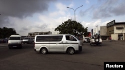 Hearses carrying the bodies of the United Nations peacekeepers killed in western Ivory coast near the Liberia border, arrive at IVOSEP mortuary in Abidjan, June 9, 2012. 