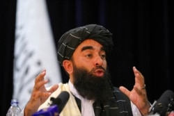 FILE - Taliban spokesman Zabihullah Mujahid speaks in Kabul, Afghanistan, Aug. 17, 2021.