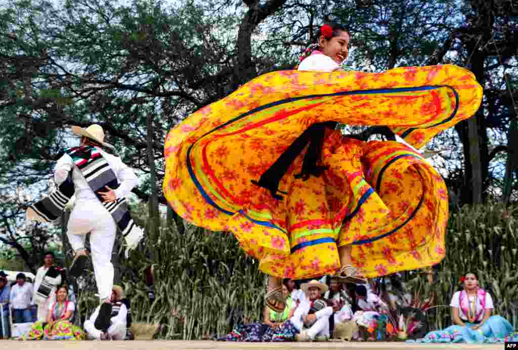 Regional dancers perform at the Guelaguetza festival in Zaachila, Oaxaca, Mexico, July 30, 2018.
