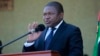 Mozambique President Filipe Nyusi delivers a speech during the state funeral of Mozambique's opposition leader, Alfonso Dhlakama, in Beira, May, 9, 2018. Starting soon, journalists covering Nyusi and Mozambique will be expected to pay what may be the highest registration fees in the world.   