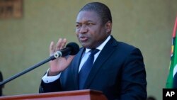 FILE - Mozambique President Filipe Nyusi delivers a speech during the state funeral of Mozambique's opposition leader, Alfonso Dhlakama, in Beira, May, 9, 2018. Mozambique's ruling party on Sunday endorsed President Nyusi as its candidate for presidential elections in October.