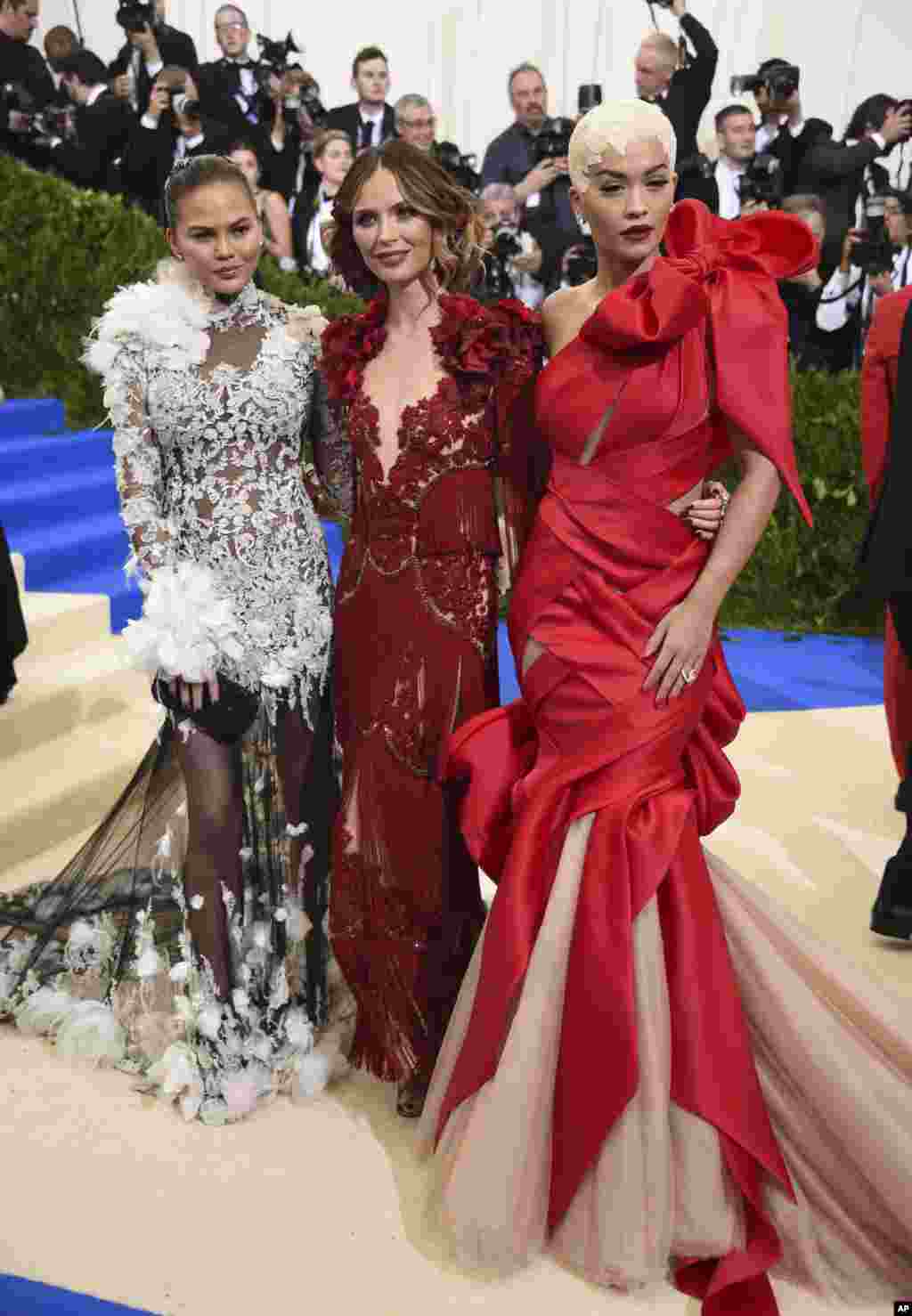 Chrissy Teigen, from left, Georgina Chapman and Rita Ora attend The Metropolitan Museum of Art's Costume Institute benefit gala celebrating the opening of the Rei Kawakubo/Comme des Garçons: Art of the In-Between exhibition on May 1, 2017, in New York.