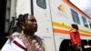 FILE - People disembark from a train in Kimuka on the Standard Gauge Railway (SGR) line constructed by the Chinese Communications Construction Company (CCCC) and financed by Chinese government, Oct. 16, 2019 .