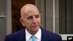Tom Barrack exits Brooklyn Federal Court on Oct. 21, 2022, in New York. Barrack, the onetime chair of the Trump's inaugural committee, is accused of using his “unique access” as a longtime friend of Trump to manipulate the Trump administration to advance the interests of the UAE.
