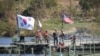 South Korean soldiers take part in a joint river crossing operation drill with U.S. troops in Yeoju, South Korea, Oct. 19, 2022. 