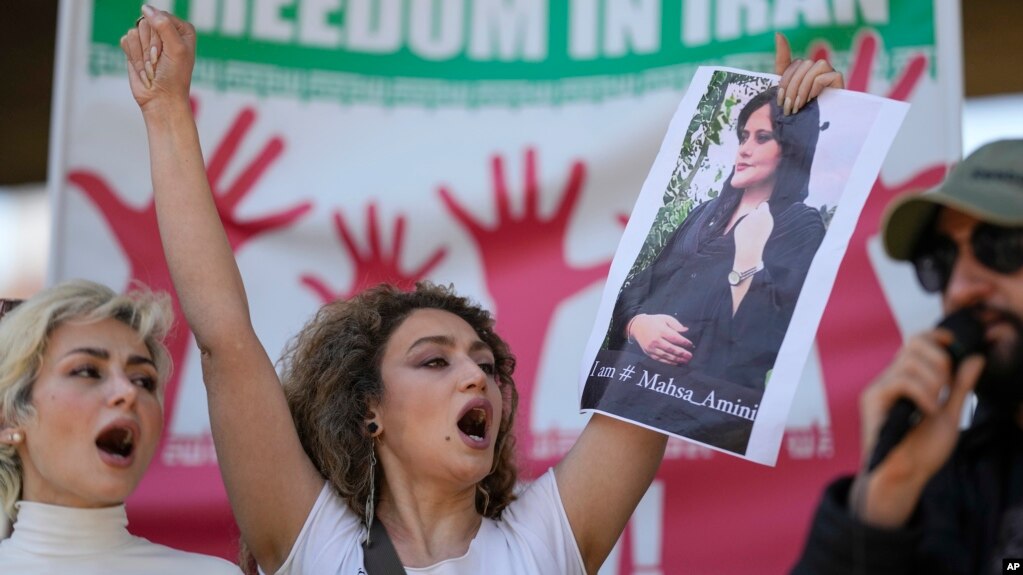 Iranians who live in Brazil protest against the death of Iranian woman Mahsa Amini, who died in Iran while in police custody, in Sao Paulo, Brazil, Sept. 23, 2022.