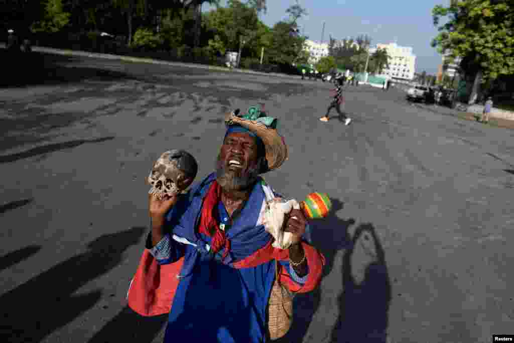 A man protests against Haitian Prime Minister Ariel Henry in Port-au-Prince, Oct. 17, 2022.