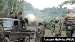 FILE: DRC soldiers from the FARDC fighting with M23 near the town of Rutshuru. 