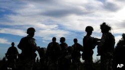 Ukrainian personnel take part in training at a military base with U.K. Armed Forces in Southern England, Oct. 12, 2022. 