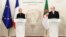 FILE - French Prime Minister Elisabeth Borne and Algerian Prime Minister Aymen Benabderrahmane deliver a joint statement in Algiers on October 9, 2022. 