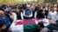 People attend the funeral prayer of slain senior Pakistani journalist Arshad Sharif, in Islamabad, Oct. 27, 2022. Sharif was shot and killed by Nairobi police in what was called a case of "mistaken identity" related to a carjacking.