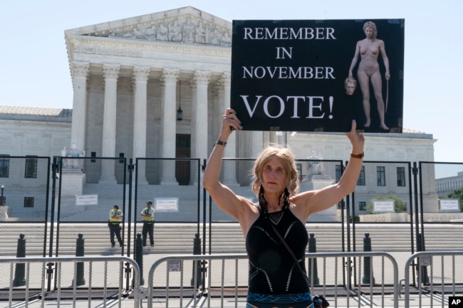 FILE - Nicky Sundt, of Washington, protests outside of the Supreme Court, June 29, 2022, in Washington. (AP Photo/Jacquelyn Martin, File)