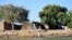 FILE - The village of Blaram on the Logone river is seen during normal water levels, at the Cameroon-Chad border, March 1, 2013. Recent flooding has devastated the region.