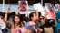 FILE - Protesters gather outside the UN headquarters in Erbil on Sept. 24, 2022, to protest the death of Masha Amini, who had fallen into a coma for three days after being detained by the morality police in Tehran, Iran. 