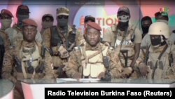 Kiswensida Farouk Aziz Sorgho announces on television that army captain Ibrahim Traore has ousted Burkina Faso's military leader Paul-Henri Damiba and dissolved the government and constitution, in Ouagadougou, Burkina Faso.