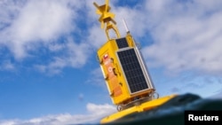 A buoy called 'Suyai,' designed to help avoid ship collisions with whales, floats at the 'Corcovado' gulf area in the coast of Chiloe, Chile, October 10, 2022. (Fundacion MERI/Handout via REUTERS)