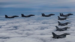 ကိုရီးယားကျွန်းဆွယ်မှာ တောင်နဲ့မြောက် စစ်လေယာဉ်တွေ အင်အားပြ.mp3