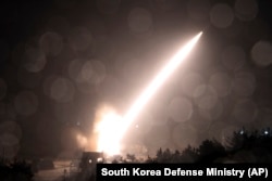 FILE - In this photo provided by South Korea Defense Ministry, n Army Tactical Missile System or ATACMS, missile is fired during a joint military drill between U.S. and South Korea at an undisclosed location in South Korea, Oct. 5, 2022.