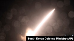 FILE - In this photo provided by the South Korean Defense Ministry, an Army Tactical Missile System, or ATACMS, is fired during a joint military drill involving U.S. and South Korean forces at an undisclosed location in South Korea, Oct. 5, 2022.