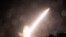 In this photo provided by South Korea Defense Ministry, an Army Tactical Missile System or ATACMS, missile is fired during a joint military drill between U.S. and South Korea at an undisclosed location in South Korea, Oct. 5, 2022. 