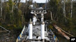 A view of a damaged bridge in the retaken village of Bohorodychne, eastern Ukraine, Oct. 22, 2022.