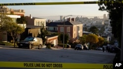 Police tape cordons off a street outside the home of Paul Pelosi and his wife, House Speaker Nancy Pelosi, in San Francisco, California, Oct. 28, 2022.