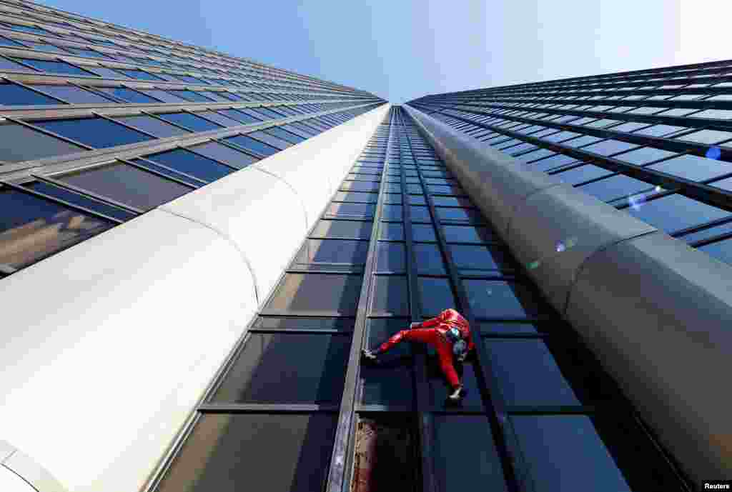 French &quot;Spiderman&quot; Alain Robert climbs Montparnasse Tower to highlight the fuel and energy crisis, amid weeks-long union-led blockades of petrol depots in the country, in Paris, France.