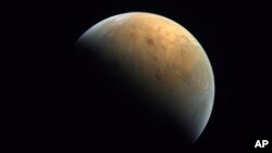 FILE - This image captured by the United Arab Emirates' "Amal" ("Hope") probe shows the planet Mars on Feb. 10, 2021. (Mohammed bin Rashid Space Center/UAE Space Agency, via AP, File)