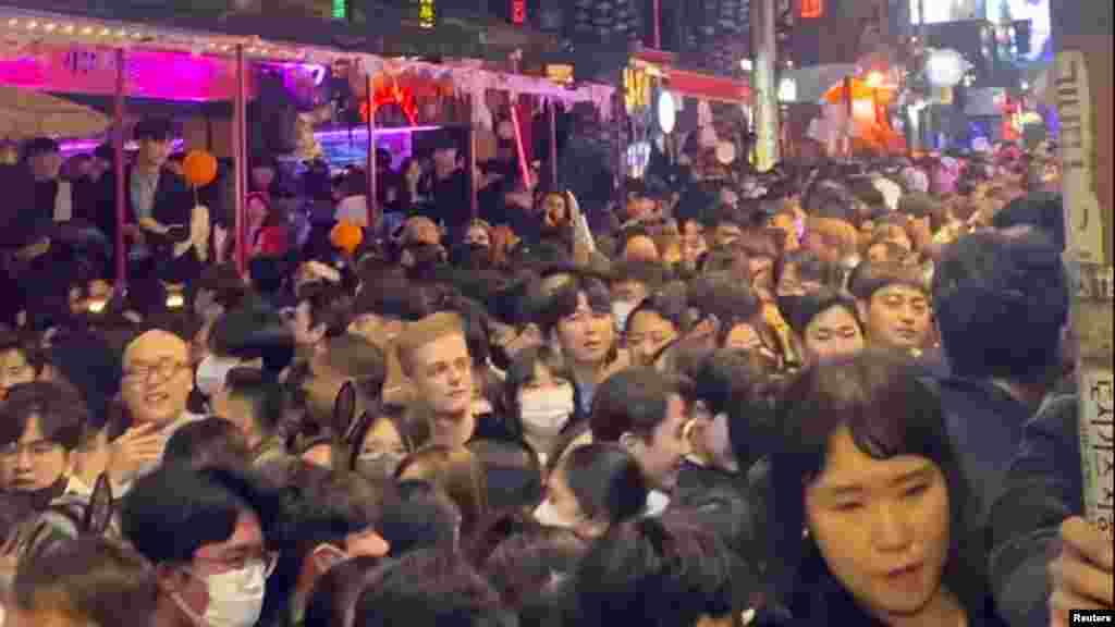 A dense crowd during a Halloween festival in Seoul, South Korea, Oct. 29, 2022, is seen in this screengrab obtained from a social media video.