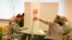 Latvians mark their ballots at a polling station during general elections in Riga, Latvia, Oct. 1, 2022.