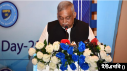 বাংলাদেশের রাজধানী ঢাকার একটি হোটেলে জাতিসংঘ পুলিশ দিবসের উদ্বোধনী অধিবেশনে স্বরাষ্ট্রমন্ত্রী আসাদুজ্জামান খাঁন। ৩০ অক্টোবর, ২০২২। 