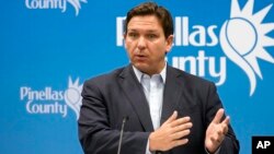 FILE - Florida Gov. Ron DeSantis speaks during a news conference at the Pinellas County Emergency Operations Center, Sept. 26, 2022, in Largo, Fla.