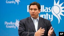 FILE - Florida Gov. Ron DeSantis speaks during a news conference at the Pinellas County Emergency Operations Center, Sept. 26, 2022, in Largo, Fla. 