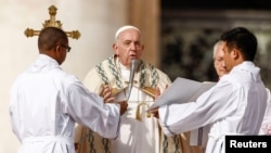 Pope Francis attends a mass to canonise two new Saints, Giovanni Battista Scalabrini and Artemide Zatti in St. Peter's Square, at the Vatican, Oct. 9, 2022. 