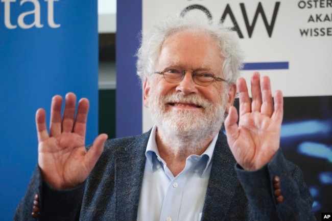 Professor Anton Zeilinger from the University of Vienna attends a news conference at the Institute for Quantum Optics and Quantum Information in Vienna, Austria, Tuesday, Oct. 4, 2022. (AP Photo/Theresa Wey)