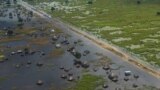 FILE-An aerial view shows flooded homes within a village after the River Nile broke the dykes in Jonglei State, South Sudan October 5, 2020. REUTERS/Andreea Campeanu