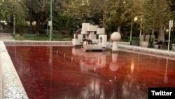 This image posted to Twitter Oct. 7, 2022 shows a fountain in Park Daneshjoo or Student Park in Tehran. An artist allegedly colored the water red in protest of the Iranian regime's deadly crackdown amid weeks of protests sparked by the death of Mahsa Amin