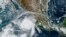 This satellite image taken at 15:30 UTC and provided by NOAA shows Hurricane Roslyn approaching the Pacific coast of Mexico, Oct. 22, 2022.