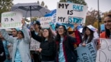 FILE - Students and activists rally outside the Supreme Court as the court before oral arguments in two cases that could decide the future of affirmative action in college admissions, Monday, Oct. 31, 2022, in Washington. (AP Photo/J. Scott Applewhite)