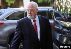 FILE - Special Counsel John Durham departs the U.S. Federal Courthouse in Washington, May 17, 2022.