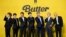 FILE- Members of South Korean K-pop band BTS, V, SUGA, JIN, Jung Kook, RM, Jimin, and j-hope from left to right, pose for photographers ahead of a press conference to introduce their new single "Butter" in Seoul, South Korea, May 21, 2021.