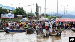 FILE: Thousands of travelers are stranded in Nigeria's Kogi state after roads to other parts of the West African nation became submerged in floods, Oct. 6, 2022. More than 600 have died and more than 1 million have been displaced due to Nigeria's worst flooding in a decade. 