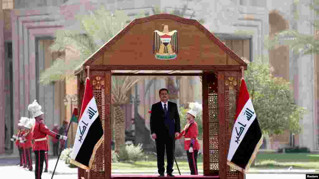 New Iraqi Prime Minister Mohammed Shia al-Sudani arrives for the official handover ceremony in Baghdad. (Iraqi Prime Minister Media Office/Handout via Reuters)