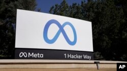 Facebook's Meta logo sign is seen at the company headquarters in Menlo Park, Calif., on, Oct. 28, 2021. (AP Photo/Tony Avelar, File)