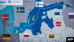 This file photo taken on March 1, 2022 shows a container decorated with a map showing the position of the Nord Stream 2 gas pipeline, which never entered into service to deliver Russian gas to European households, in Lubmin's industrial park, northeastern Germany.