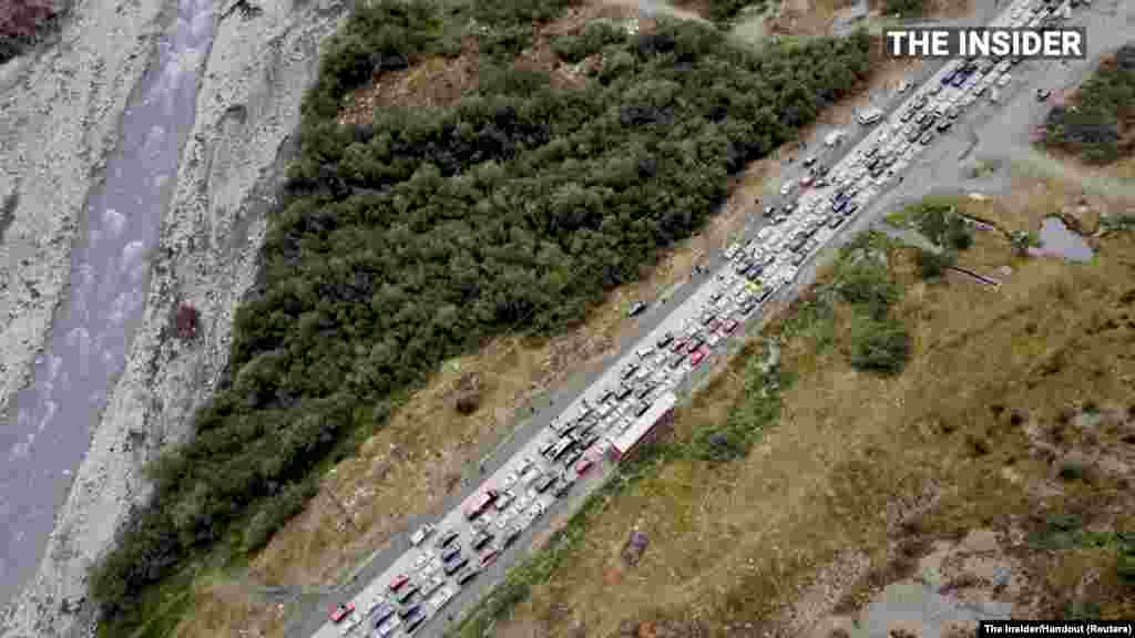 Drone footage shows long lines of vehicles leaving Russia at its border with Georgia, in Verkhny Lars, Russia, Sept. 26, 2022, in this still image obtained from a video.