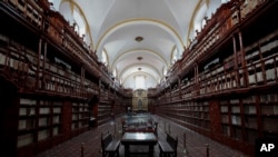 FILE - The interior of Palafoxiana library in Puebla, Mexico, Sept. 13, 2022. It is the oldest public library in the Americas, according to UNESCO. 