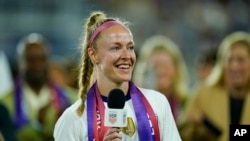 FILE - U.S. captain Becky Sauerbrunn speaks following a women's soccer match against Nigeria, Sept. 6, 2022, in Washington.