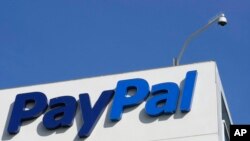 FILE - This Jan. 19, 2011, photo shows an exterior view of eBay/PayPal offices in San Jose, Calif. 